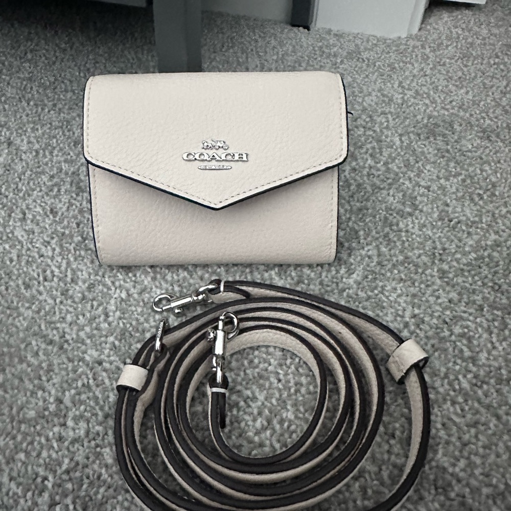 Coach White leather mini Envelope wallet with matching strap and silver hardware